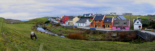 Irish village with river and horse in foreground