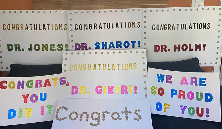 Congratulation signs for recent DNP graduates